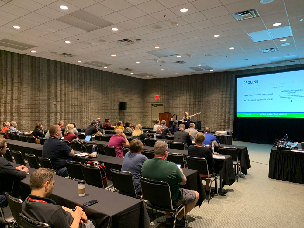 Attendees listen to a speaker during an HPBExpo education session
