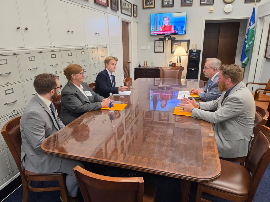 SEHPBA members meet with congressional staff around a conference table