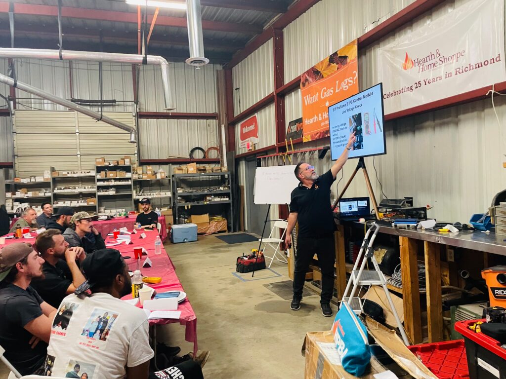 Instructor teaches a Proflame 2 control module class to hearth technicians